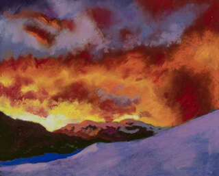 Sunset over snowy mountains